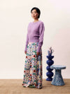 Wide-leg patchwork print trousers with high waist and side-tie fastening in a multicoloured bohemian design.
