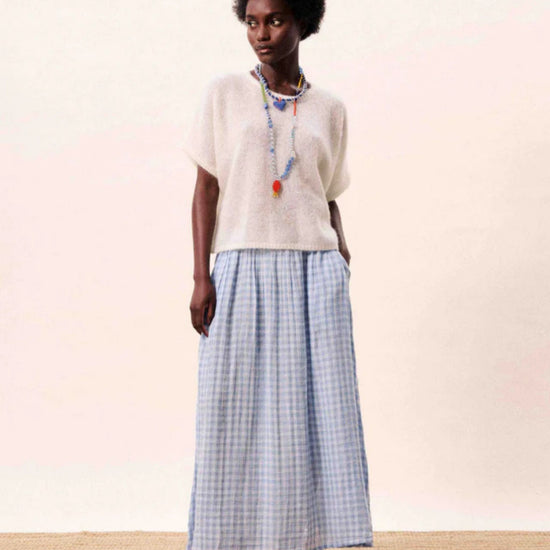 Light blue gingham A line midi skirt with a flowing silhouette.