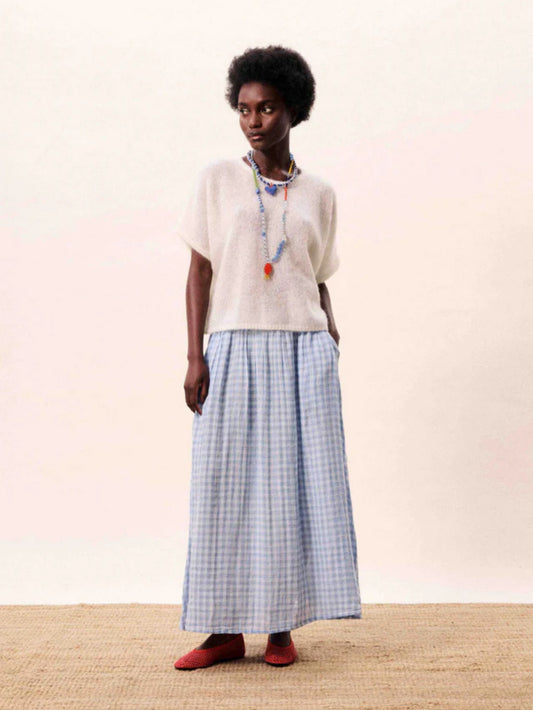 Light blue gingham A line midi skirt with a flowing silhouette.