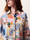 Womenâ€™s lightweight shirt with a relaxed fit and button-through front.