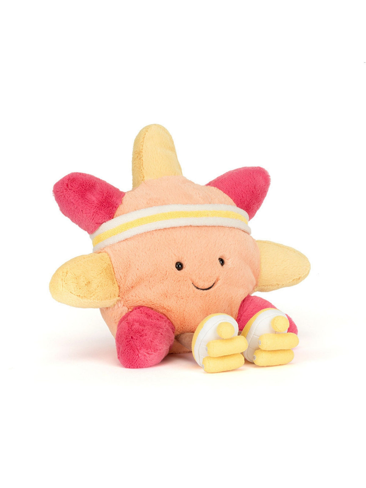 A plush toy character with a peach-colored body, pink ears and feet, yellow wings and hands, and a white and yellow headband, sitting against a plain white background.