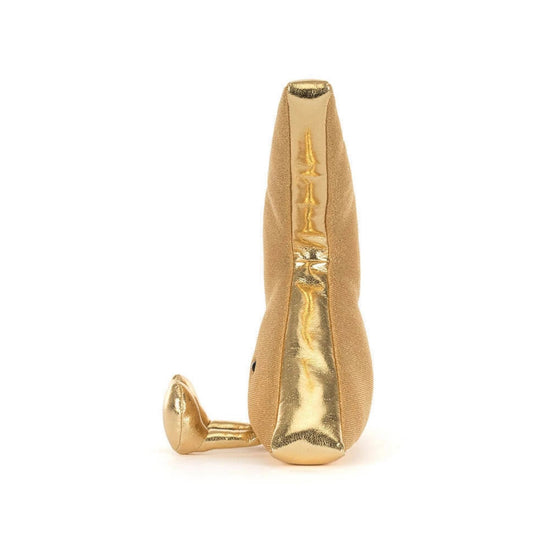 A small gold-toned plush shaped like a lightning bolt photographed upright on a plain white background.