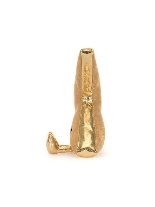 A small gold-toned plush shaped like a lightning bolt photographed upright on a plain white background.