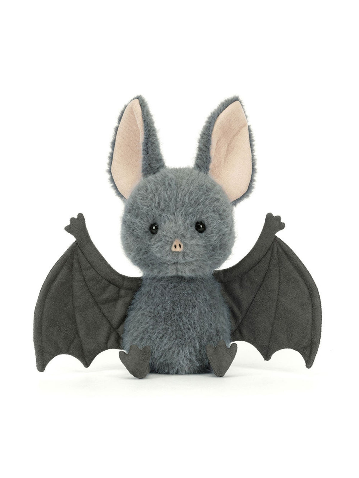 A plush toy bat in medium gray with large black wings, pink inner ears, and small black feet, sitting against a plain white background.