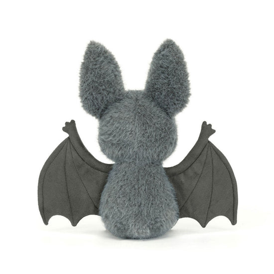 A gray plush toy shaped like a bat, shown from the back with its wings spread, on a plain white background.