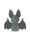 A gray plush toy shaped like a bat, shown from the back with its wings spread, on a plain white background.