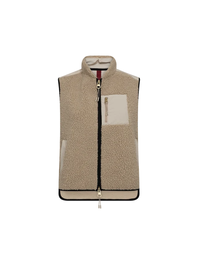 A sleeveless zip-front fleece vest in beige and cream tones, shown flat against a solid white background. The vest features a textured beige fleece body, solid cream panels on the chest and lower hem, a black zipper, and a small red accent tab near the collar.