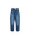 A pair of medium-wash blue denim jeans with rolled cuffs, shown flat against a solid white background.