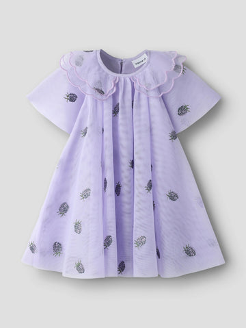 A light purple baby dress with a ruffled Peter Pan collar and scattered embroidered pineapples, shown against a neutral light gray background.