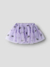 Lavender tulle skirt with floral patterns on a white background