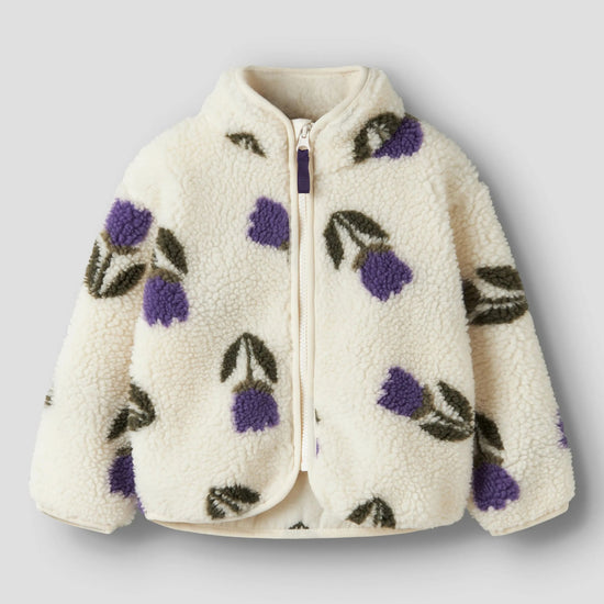 White fleece jacket with purple floral patterns on a light gray background