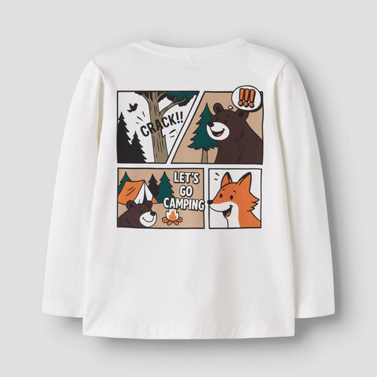 A white long-sleeve t-shirt with a cartoon comic-style camping graphic on the back, featuring a bear, fox, and campfire scene with text.