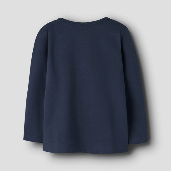 A navy blue long-sleeve top shown from the back, photographed against a neutral light gray background.