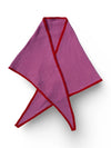A folded Pink Triangular Scarf with red trim, arranged in a crossed pattern on a white background.