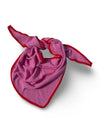 A folded Pink Triangular Scarf with red trim, arranged in a crossed pattern on a white background.