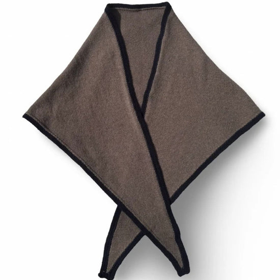 A folded Mink Triangular Scarf with Navy trim, arranged in a crossed pattern on a white background.