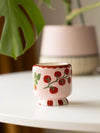 Paddywax A Dopo Candle in Heirloom Tomatoe Scent Vessel covered in vine of tomatoes
