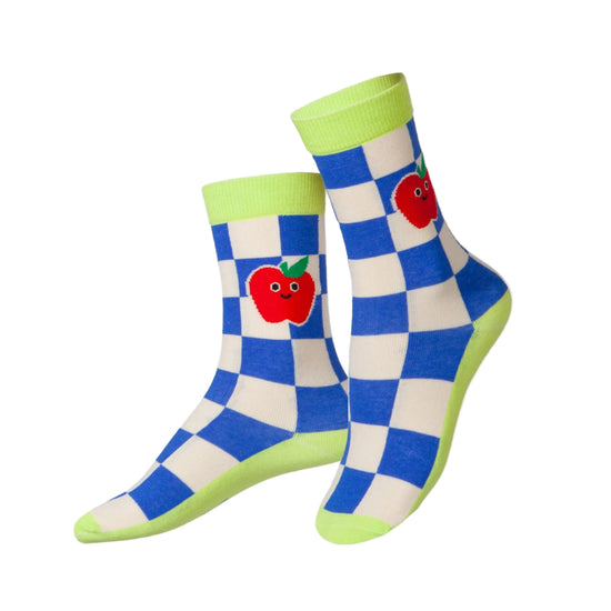 Checkered socks with apple design on a white background.