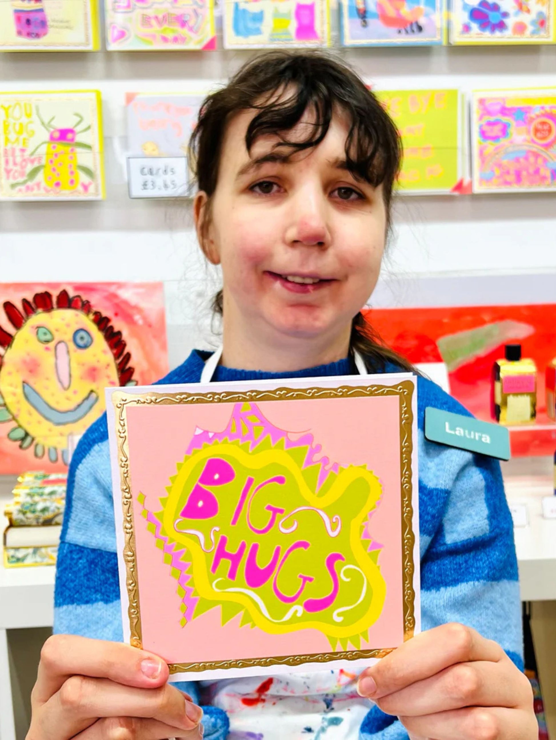Arthouse Unlimited Big Hugs Greetings Card held by Artist Laura