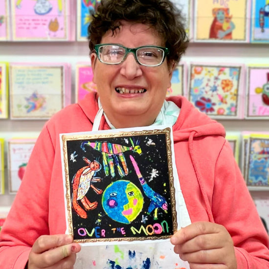 Arthouse Unlimited Over The Moon Greetings Card held by Artist Philippa