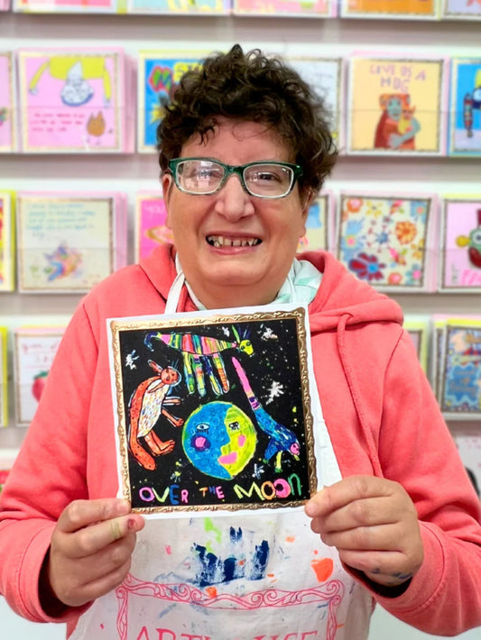 Arthouse Unlimited Over The Moon Greetings Card held by Artist Philippa