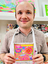 Arthouse Unlimited Take It Easy Greetings Card held by Artist Jack