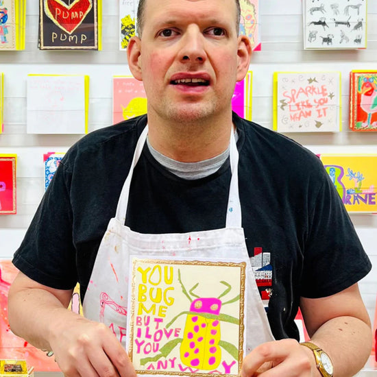 Arthouse Unlimited You Bug Me Greetings Card held by Artist Richard