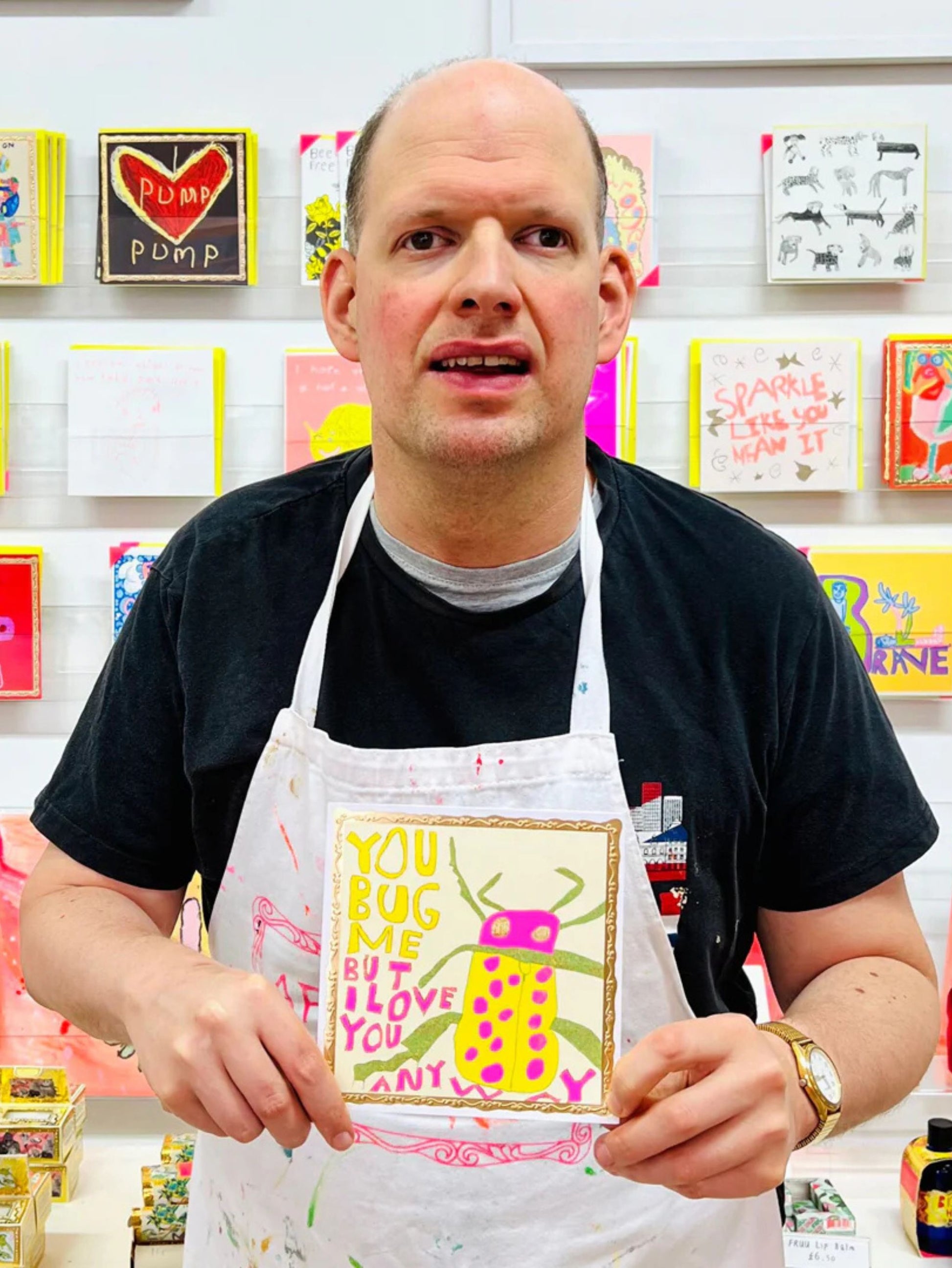 Arthouse Unlimited You Bug Me Greetings Card held by Artist Richard