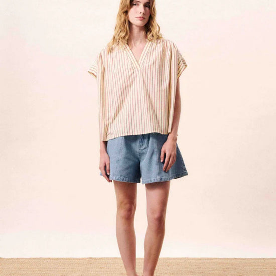 Butter yellow striped cotton blouse with a relaxed fit, button front.