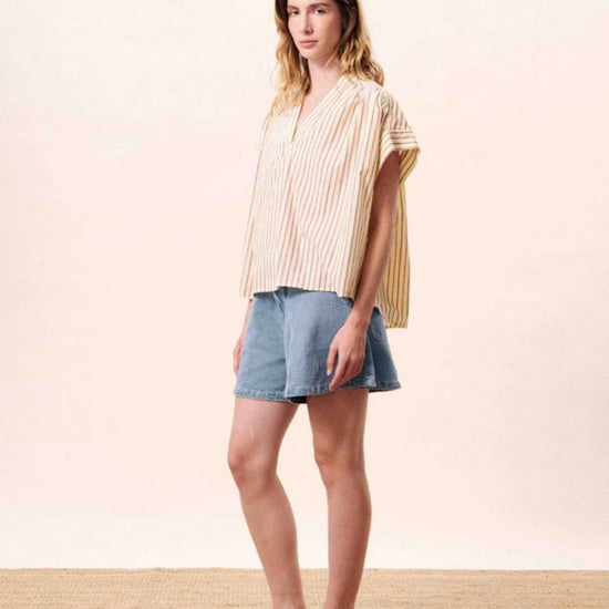 Butter yellow striped cotton blouse with a relaxed fit, button front.
