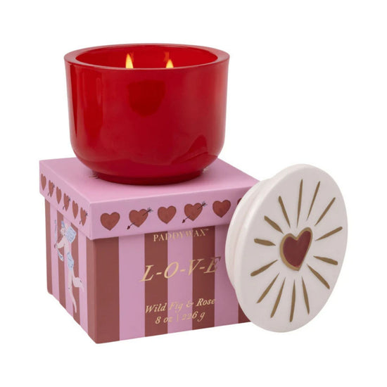 Paddywax charmed 8oz candle in scent wild fig and rose red glass vessel with heart on lid