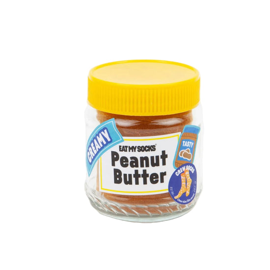 Jar of socks made to look like peanut butter with a yellow lid on a white background