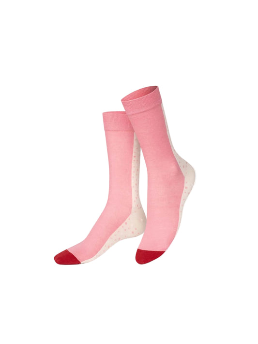 Pair of pink socks with red toes and heels on a white background