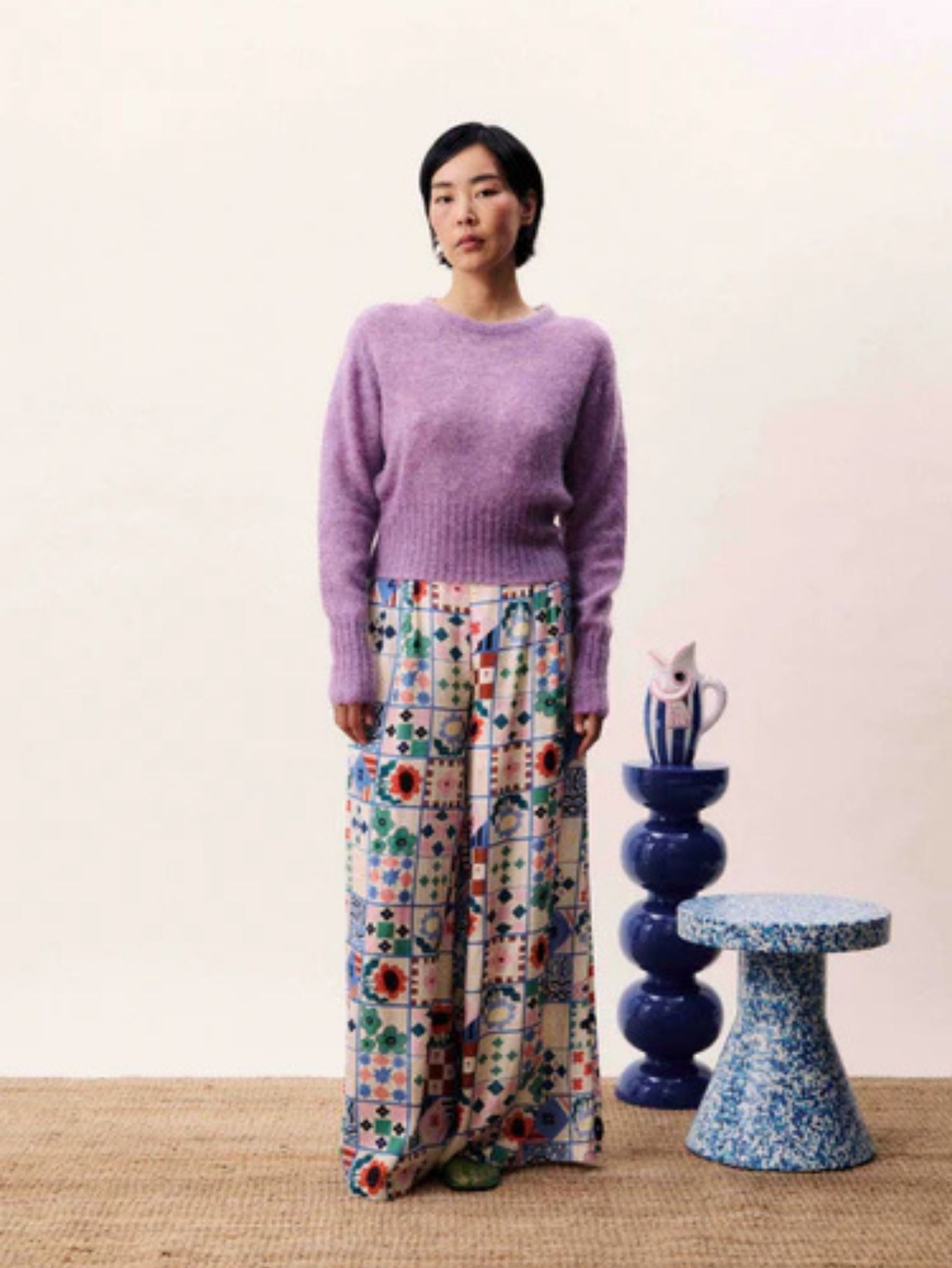 Wide-leg patchwork print trousers with high waist and side-tie fastening in a multicoloured bohemian design.
