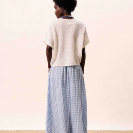 Light blue gingham A line midi skirt with a flowing silhouette.