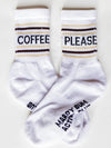 White socks with text 'Coffee Please' and 'Mardy Bum' on a white background