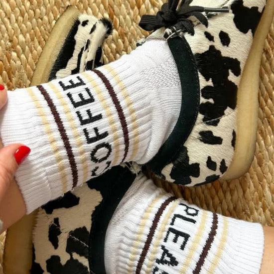 White socks with text 'Coffee Please' and 'Mardy Bum'