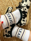 White socks with text 'Coffee Please' and 'Mardy Bum'