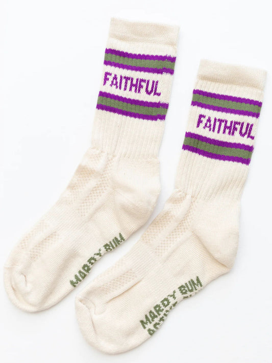 Pair of cream socks with purple and green striped bands and 'Faithful' text on a white background.