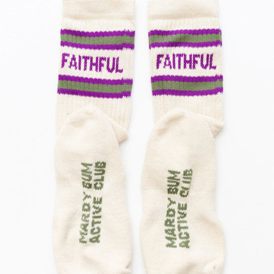 Pair of socks with 'Faithful' and 'Mardy Bum Active Club' text on a white background