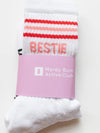 White socks with red and pink stripes and a pink band labeled 'Mardy Bum Active Club' on a white background.