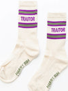 Pair of socks with 'Traitor' text and purple and green stripes on a white background