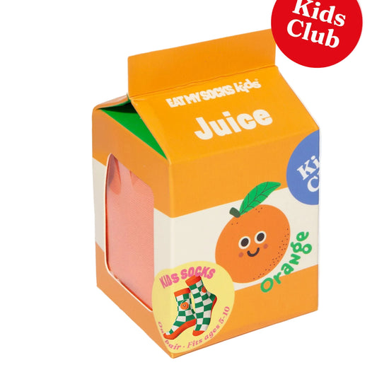 Eat My Socks Kids green and orange checkered socks with orange accents. Displayed in a Orange Juice Carton.