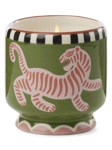 Paddywax black cedar and fig candle in a green container with a pink tiger design 