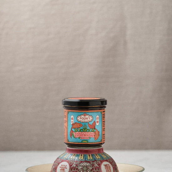 Poons London Everything Everywhere Sauce in a glass jar.