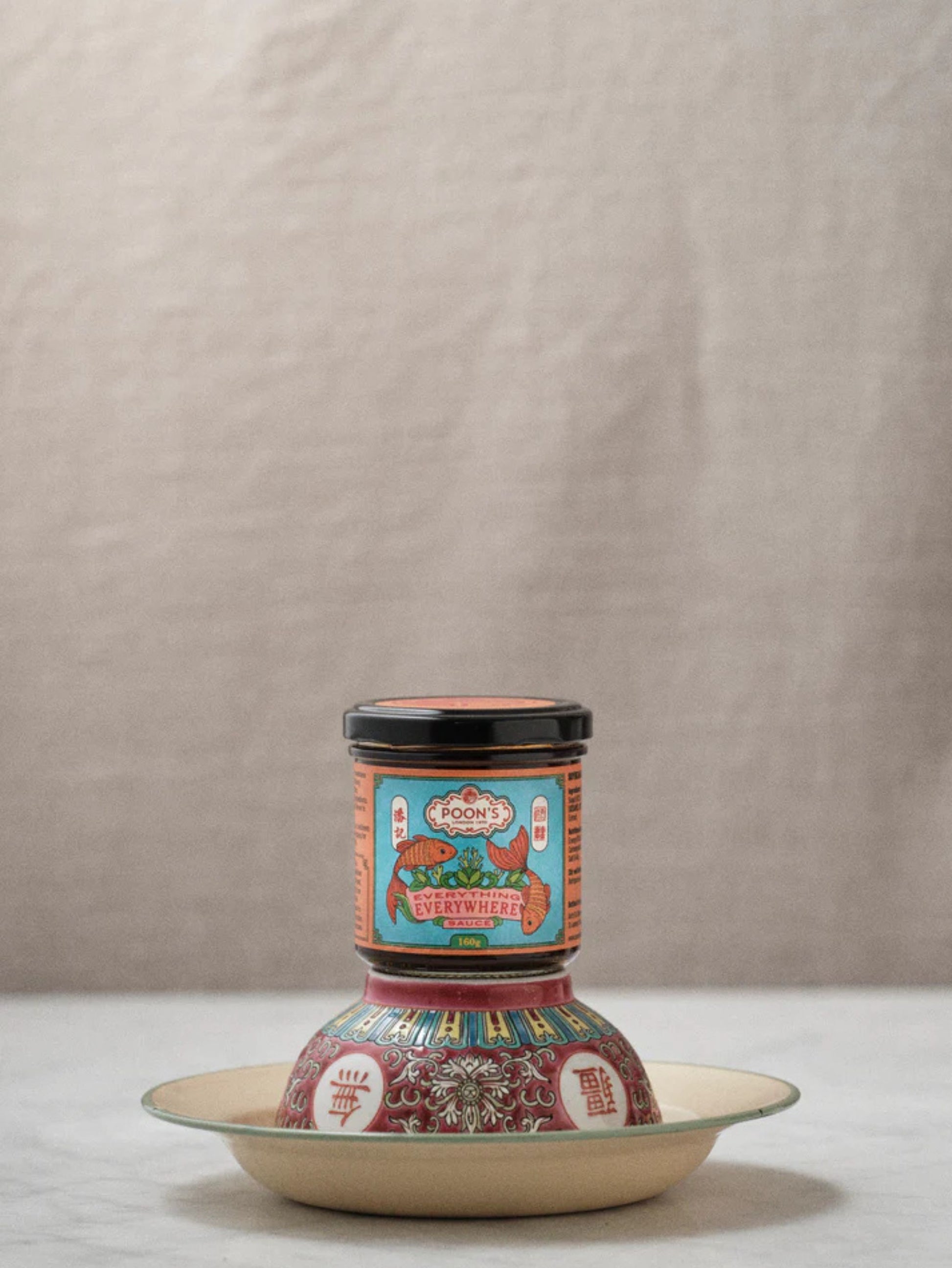 Poons London Everything Everywhere Sauce in a glass jar.