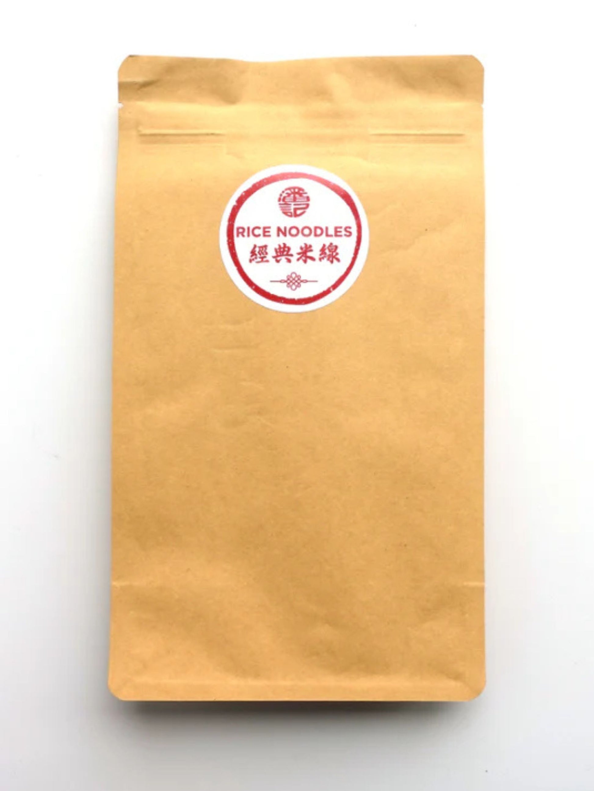 A kraft paper stand-up pouch with a circular red and white label reading 'RICE NOODLES' and Chinese characters, photographed on a plain white background.