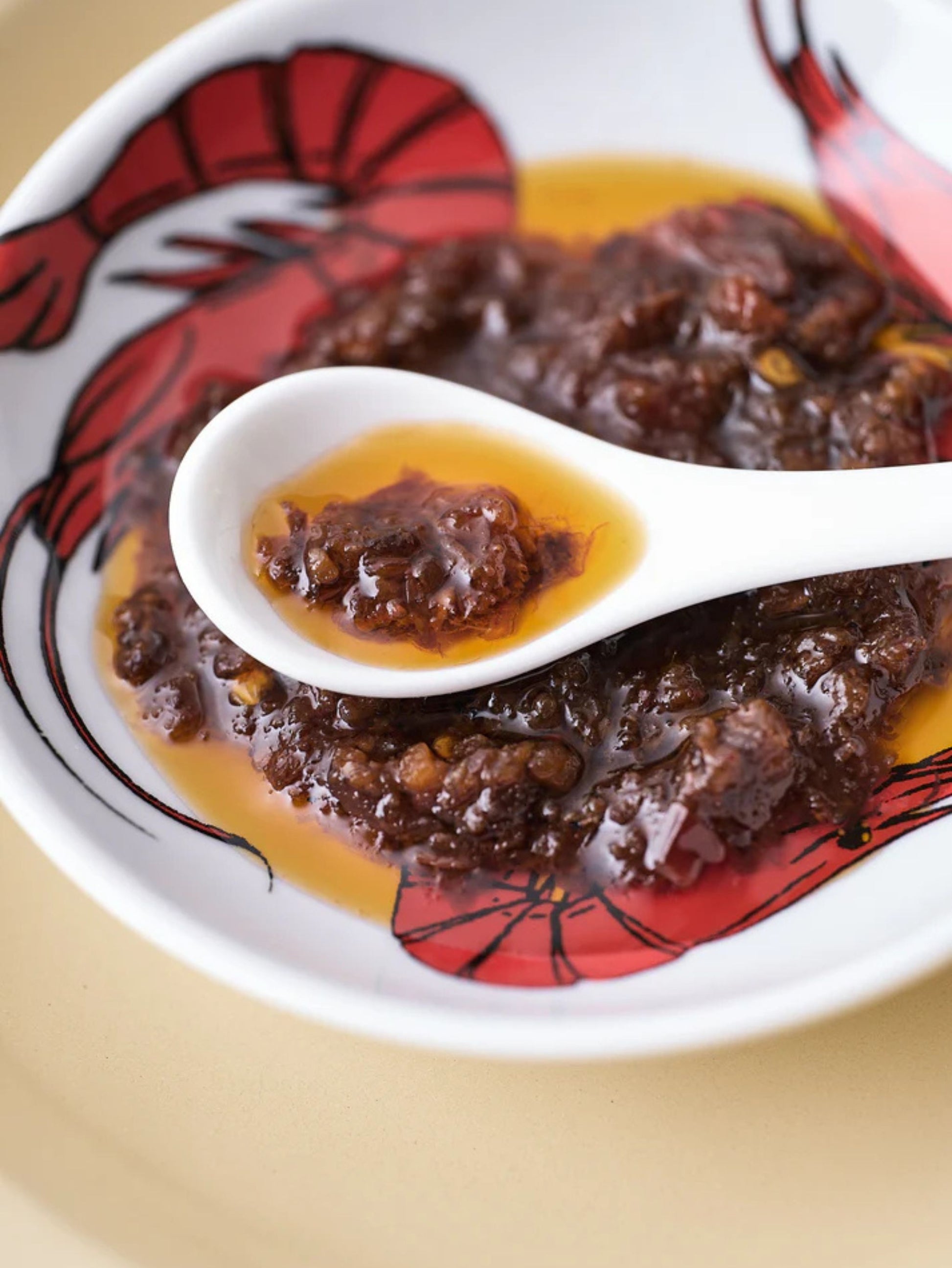 Jar of Poons London WO Sauce  in a bowl
