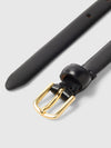 Black belt with a gold buckle on a light gray background